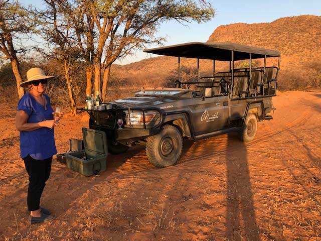 Marataba, South Africa Safari Adventure - Kendall’s sister enjoys the traditional “Sundowner” custom.