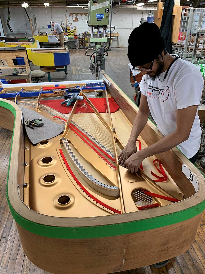 Craftsman at the Steinway Factory