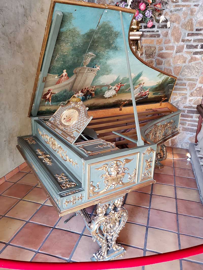 Above: The Playel piano, c. 1885, was used in the film about Chopin in 1945 called “A Song to Remember.” The film inspired Liberace’s use of the candelabra.