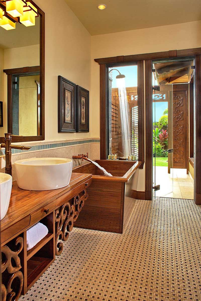 “John asked me if we could make a custom wood bathtub for one of the guestrooms. Quickly, I said no! Then John talked me into it.” Bespoke Tub, vanity, millwork, and custom stone and glass mosaic by Infinite Trend. Photo courtesy of Infinite Trend.