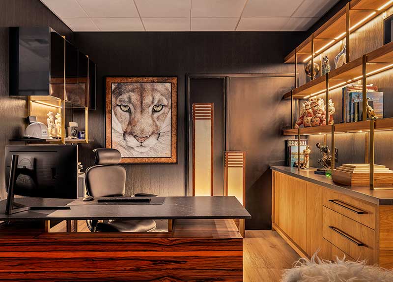 “Macassar ebony veneer is so strikingly beautiful. That’s why I used it in the desk and the sideboard.” Cougar painting, entitled “Cosmo” is an original painting by wildlife artist Chris Hoy. Photo by Devin D Robinson