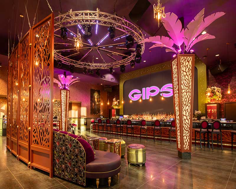 The Main Salon shows the elegant floral themed interiors. The Bar features an oversized theatrical video wall that works in concert with the DJ or hosts independent films and curated Gipsy content. Ornamental metal screens and backlit features: Slater Design Studio. Photo courtesy of Todd McBrayer/Breslin Builders