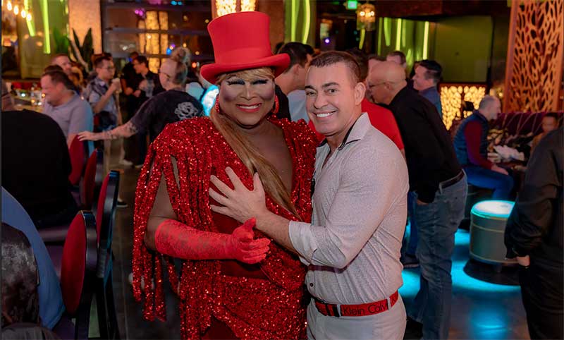  Larry Edwards, AKA Hot Chocolate (as known in his drag persona), shares a moment with Gipsy GM, Aldo Mencatto. Edwards is widely known for his Tina Turner impersonations. Photo by Edison Graff