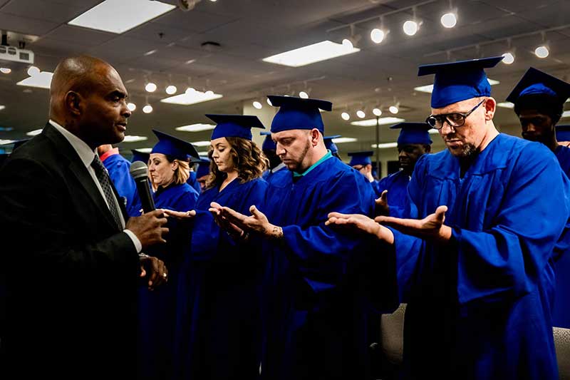 Founder and CEO Jon Ponder speaks to the graduates during the graduation ceremony held Hope For Prisoners.