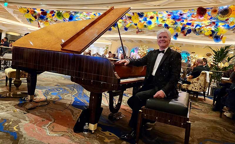 Whitney Phoenix beside the hand-crafted Steinway Grand piano inside the Petrossian Lounge at the Bellagio Resort Las Vegas.