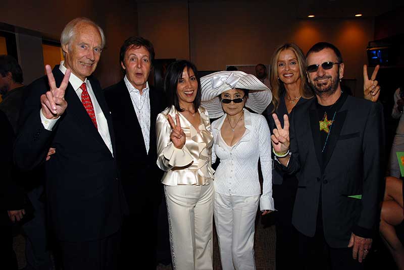 (L-R) Sir George Martin, Sir Paul McCartney, Olivia Harrison, Yoko Ono, Barbara Bach, and Ringo Star. (Photo by Kevin Mazur courtesy of Cirque du Soleil)