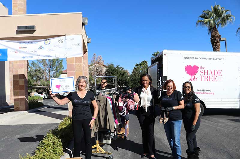 Women United clothing drive with the Shade Tree