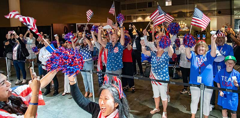 Fans cheering on Team USA. Photo by Ken Goodman