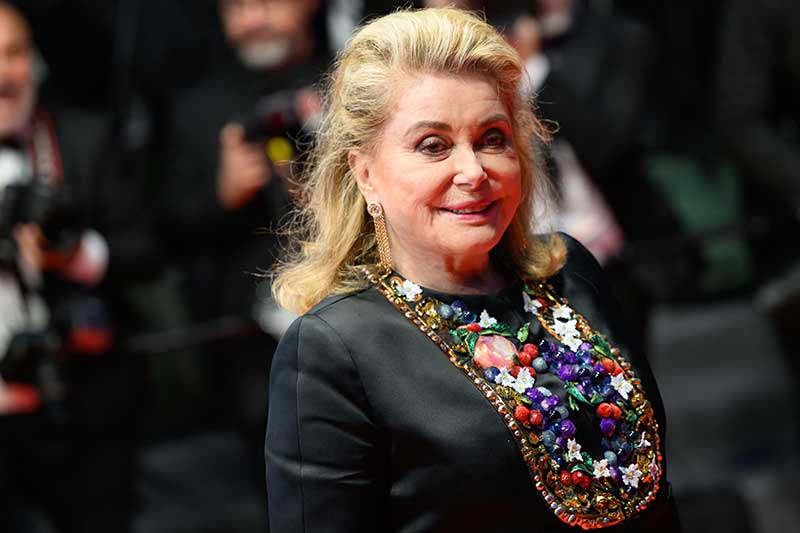 Catherine Deneuve at the 77th Cannes Film Festival. Photo by Earl Gibson III.