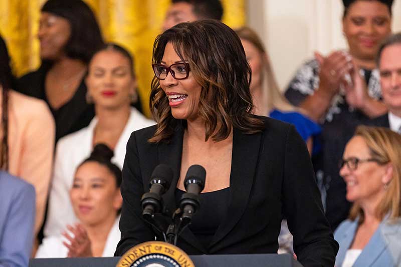 Above: Nikki Fargas speaks at The White House. Photo by Stephen Gosling NBA Photos.