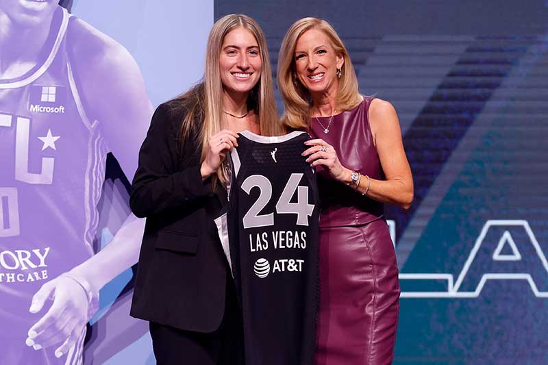 Above: April 15, 2024 WNBA Draft - Kate Martin holding jersey with Cathy Engelbert. Photo by Sarah Stier