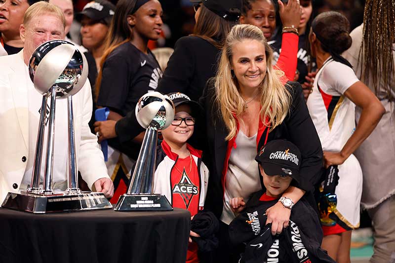 Above: October 18, 2023 WNBA Finals Game 4 - Trophy presentation with Becky Hammon and her children. Photo by Sarah Stier.