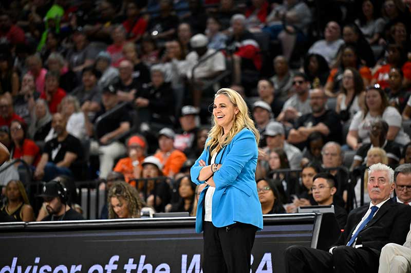 Above: June 7, 2024 Coach Becky Hammon smiles from the sideline. Photo by David Becker NBA Photos.