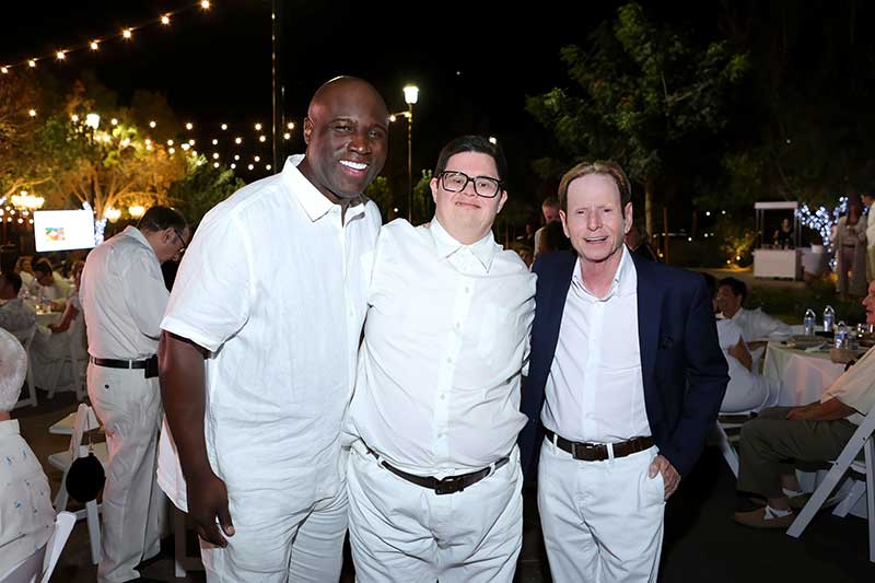  (L-R) Tony Gladney, John Owen, and Robert Dolan enjoying a party.