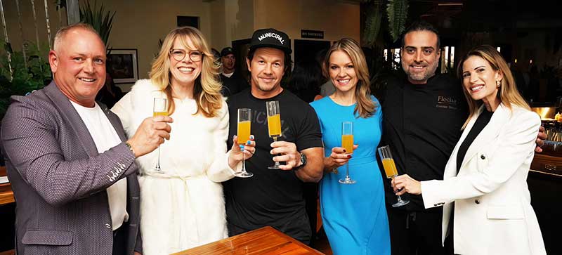 Stacey and JJ with managing partner and co-founder Randy Sharpe, Mark Wahlberg, Chef Cristhian Salazar and Sarah Jenkins. Photo by Timothy Hancock