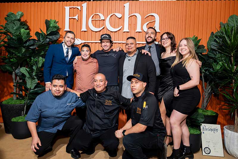 Wahlberg with his Flecha Cantina staff