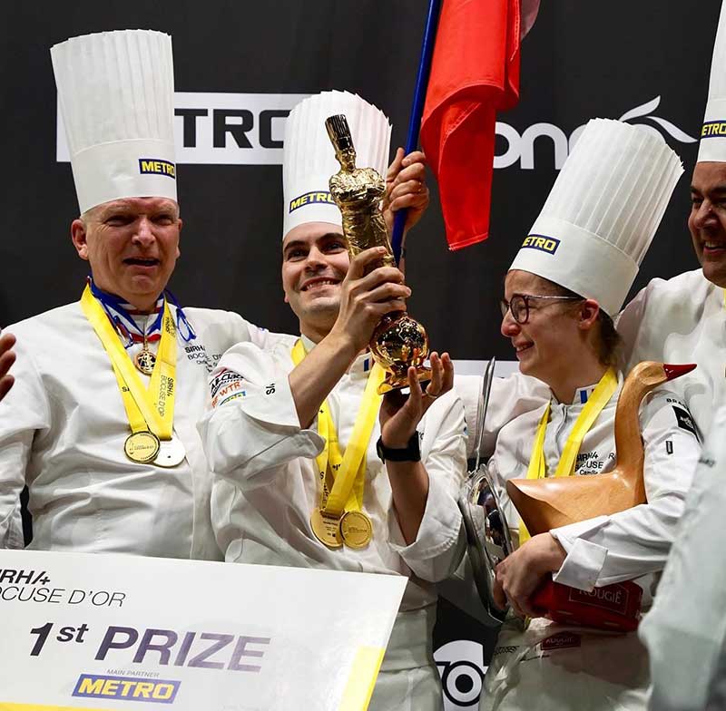 Bocuse-001 Team France wins Gold: (L-R) Coach Christophe Quantin, Head Chef Paul Marcon, Commis Camille Pigot