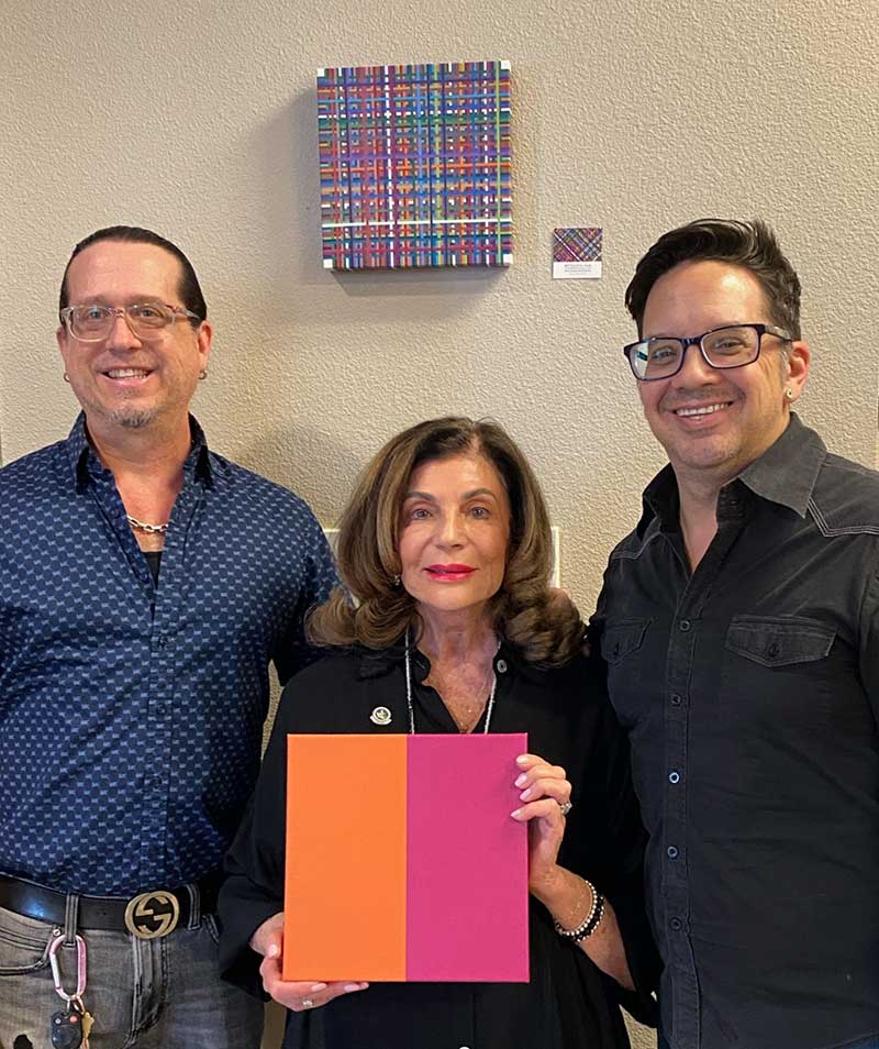 Las Vegas Mayor Shelley Berkley with Michael Patrick Thieme (left) and husband, stylist Larry Thielen Jr., delivering her third piece of MPT artwork to City Hall. Photo courtesy of Michael Patrick Thieme