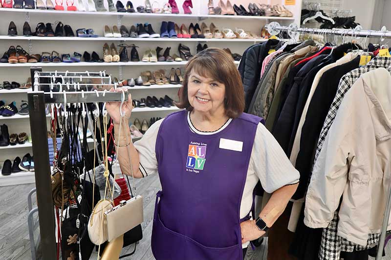Assisting Lives in Las Vegas thrift shop chair Joanie McCarty