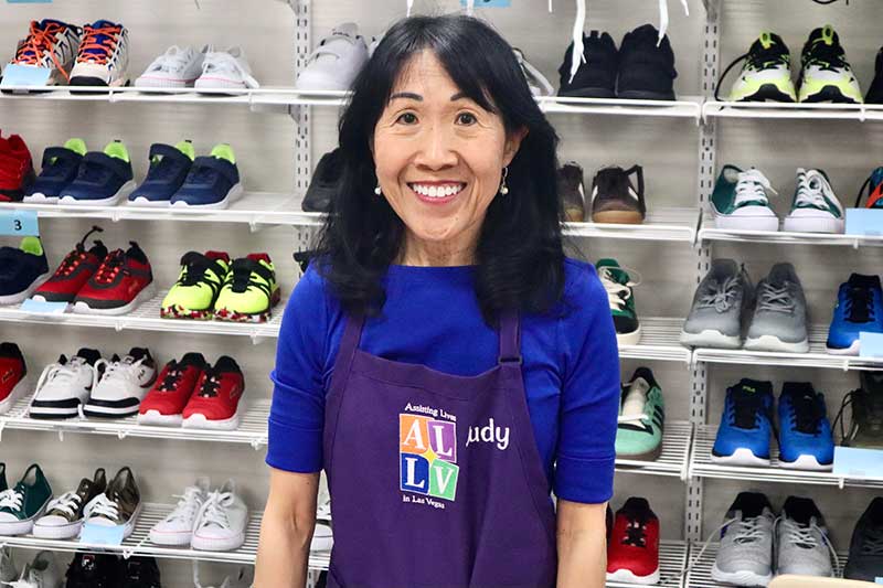 Assisting Lives in Las Vegas member volunteer Judy Freeman at Our School Boutique