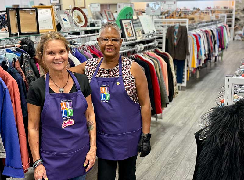 Assisting Lives in Las Vegas member volunteers Darla Gustaitis and Theresa Tillman inside the nonprofit's award-winning thrift shop