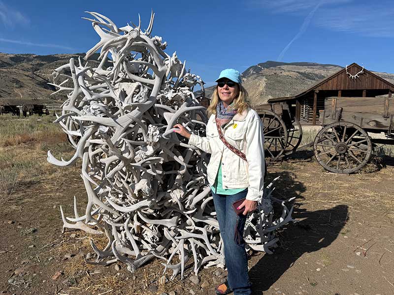 Elaine Harris exploring relics of Old Town Cody