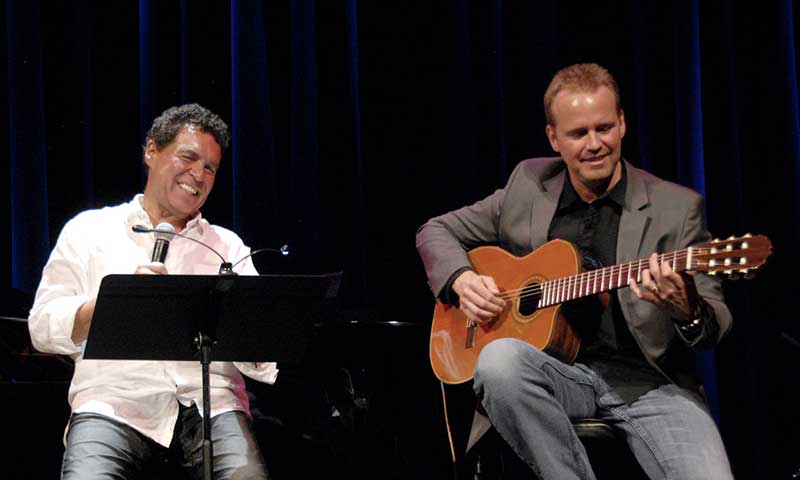 Clint Holmes performs original music with Guitarist John Wedemeyer