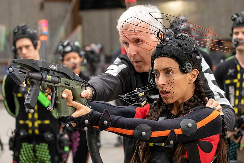 Director James Cameron and Oona Chaplin on the set of 20th Century Studios' AVATAR: FIRE AND ASH. Photo by Mark Fellman. © 2025 20th Century Studios. All Rights Reserved.