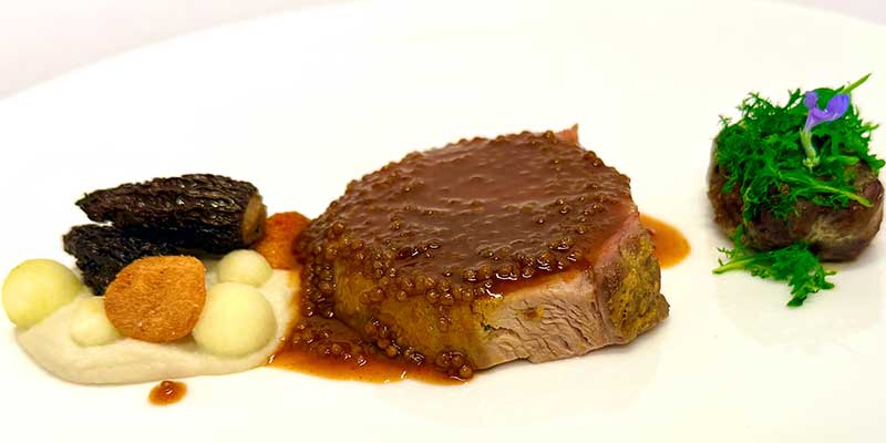 The winning dish was mustard-rubbed pork loin with pork cheek crepinette, morel farcie, sunchoke purée, tamarind pearl sauce, apple pearls and crispy sunchoke