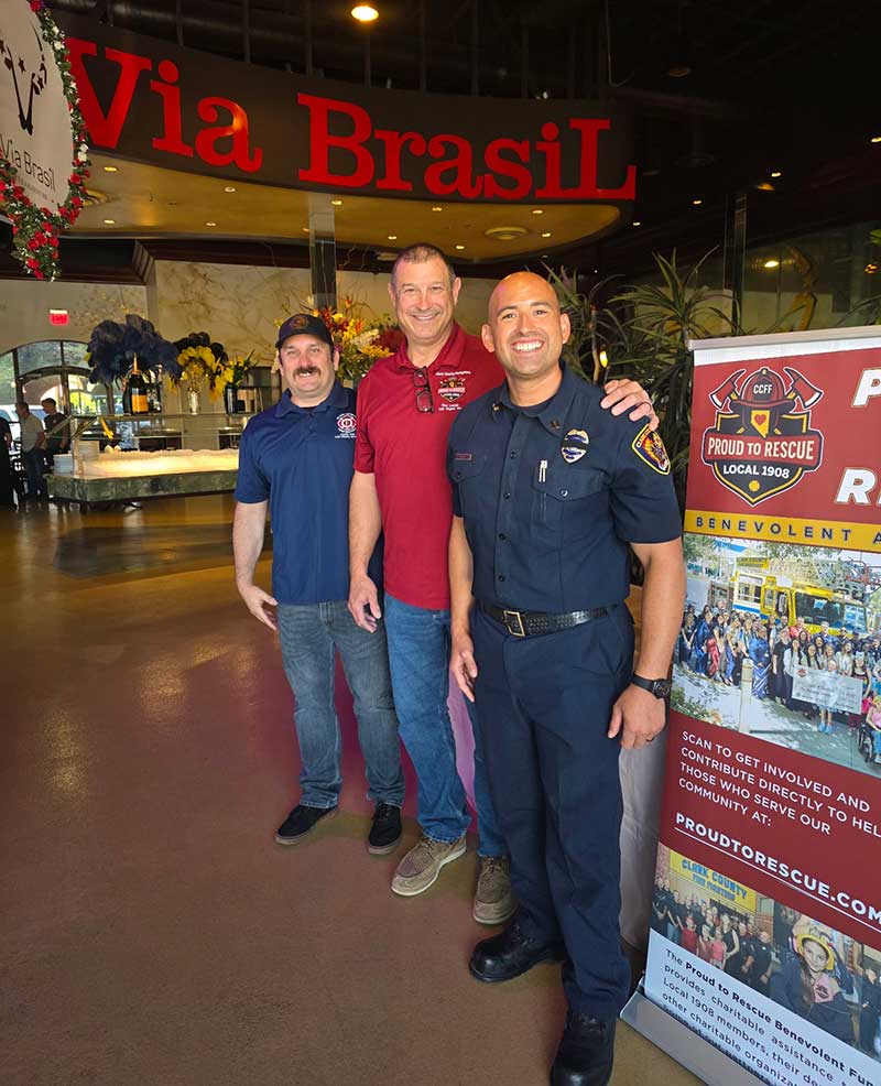 Clark County Fire Department team member, Ray LeClair, chairman of the Proud to Rescue Benevolent Fund and Fire Capt. Joey Virtuoso Clark County Fire Department team member, Ray LeClair, chairman of the Proud to Rescue Benevolent Fund and Fire Capt. Joey Virtuoso